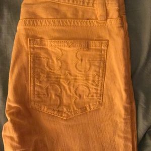 Tory Burch yellow cropped slim boot cut jeans